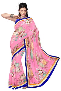 woman standing wearing pink floral sari dress thumbnail