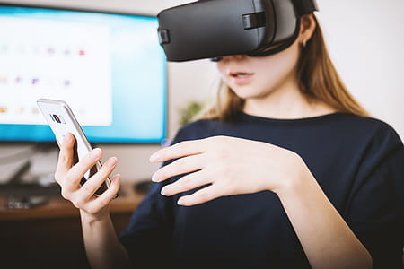 Woman using the virtual reality headset thumbnail