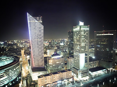 high rise building with lights on thumbnail