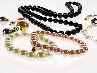 assorted-color beaded necklaces thumbnail