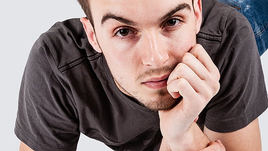 man wearing black crew-neck shirt thumbnail