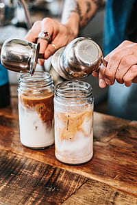 person pouring creamer into jar thumbnail