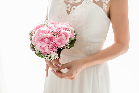 woman holding pink roses bouquet thumbnail