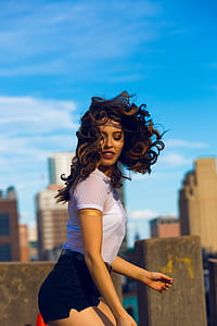 woman standing sideways thumbnail