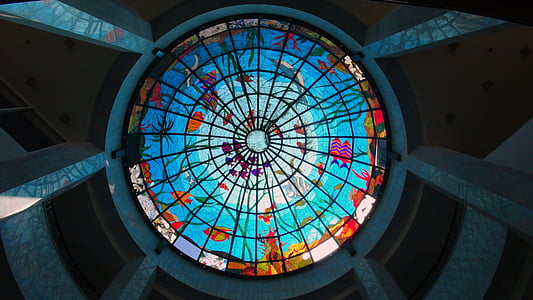 worm's eye view of multicolored ceiling stained glass thumbnail