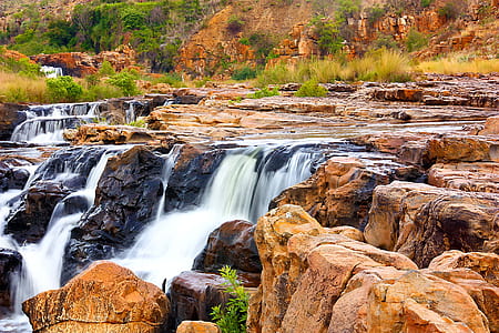 landscape photography of waterfalls thumbnail