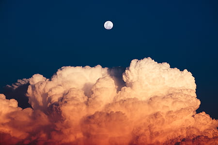 moon above cloud formation thumbnail
