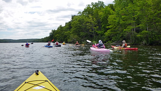 Kayakers paddling on Splitrock Reservoir - a man made lake - in Rockaway Township, Morris County, New Jersey. thumbnail