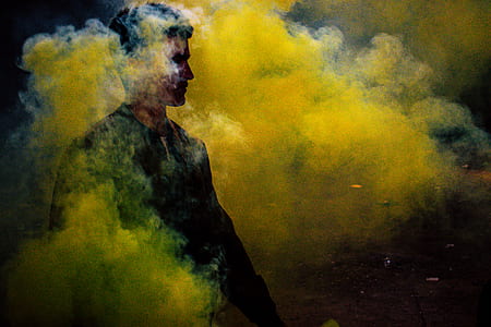 man covered with yellow smoke thumbnail