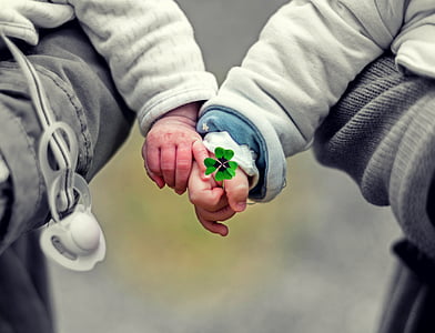 man and woman holding hands thumbnail