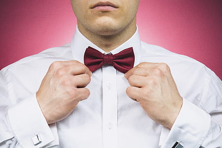 man holding red bow tie thumbnail