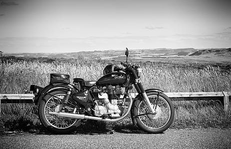 bobber motorcycle beside road thumbnail