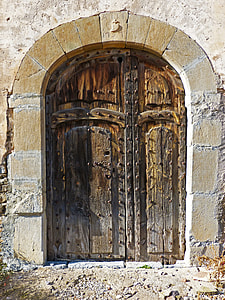 brown wooden and metal ruin door closed at daytime thumbnail