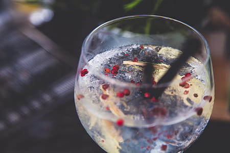 Round Clear Glass With Straw Closeup Photography thumbnail