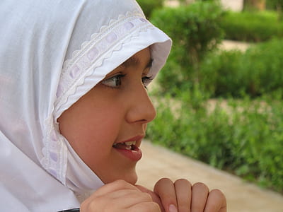 woman wearing hijab near green leaf plant thumbnail