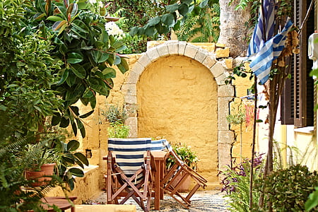 chairs near arch wall thumbnail