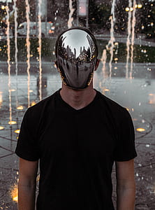 man wearing black crew-neck shirt and stainless steel mask thumbnail
