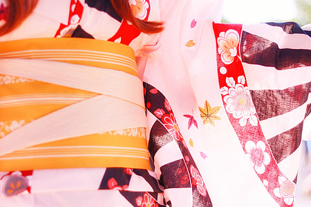 white, red, and yellow textile thumbnail