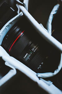 24-70 mm black Canon zoom lens in bag thumbnail