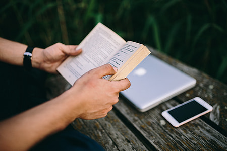 Reading book at lake thumbnail