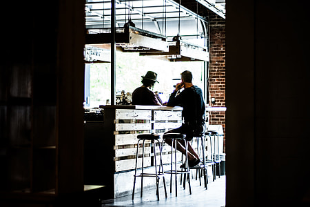 man sitting on bar stool thumbnail