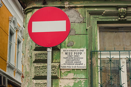 white and red road signage near Misu Popp-printed signage thumbnail