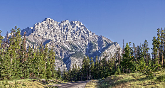 snow capped mountain under blue sky thumbnail