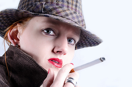 woman holding cigarette stick thumbnail