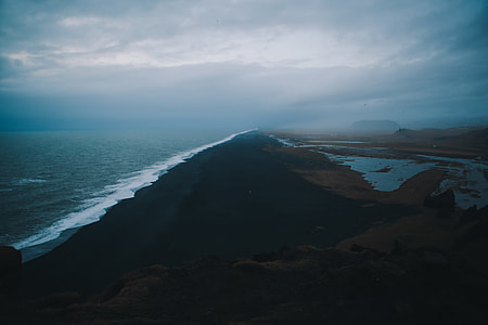 aerial view of black and brown sand in beach thumbnail