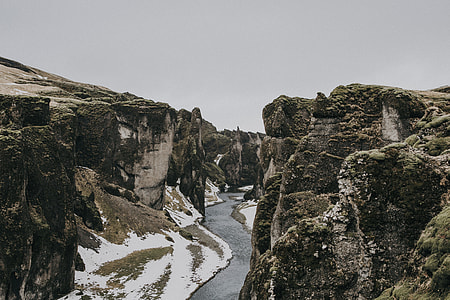river between rock formation cliffs thumbnail