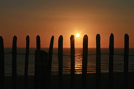 calm sea during sunset thumbnail