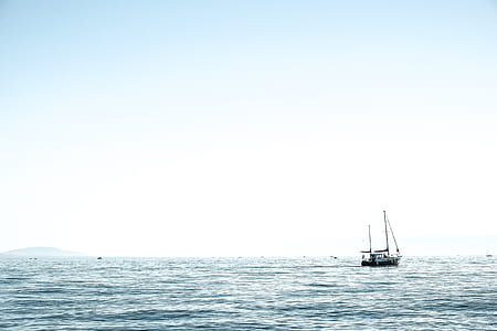 fishing boat on body of water thumbnail
