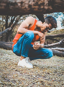 Man in Orange Tank Top thumbnail
