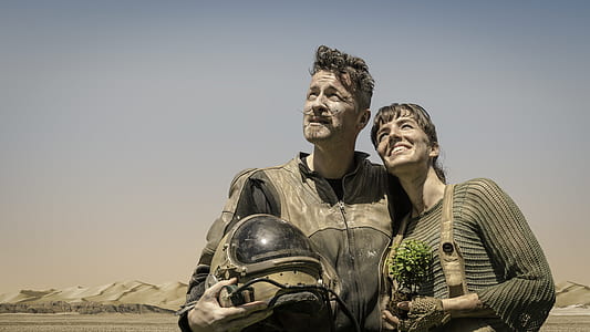 Photo of Man and Woman Looking at the Sky thumbnail