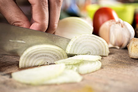 person slicing onions thumbnail