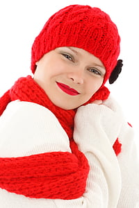woman in white knit long-sleeved shirt with red knit cap and scarf thumbnail