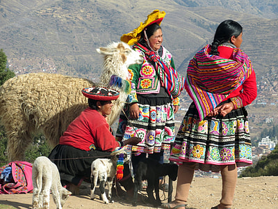 three women standing on cliff thumbnail