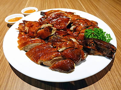 sliced peking duck on plate thumbnail