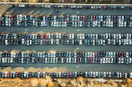 bird's eye view of vehicles in parking lot thumbnail