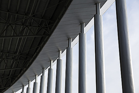 selective photo of white and black concrete posts under white sky at daytime thumbnail