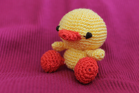 yellow and red bird amigurimi doll thumbnail