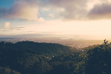 aerial photography of green mountains at daytime thumbnail