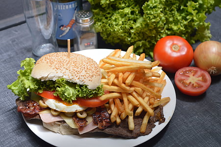 photo of burger with fries on white plate thumbnail