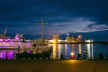 White Boat Near Dock during Nighttime thumbnail