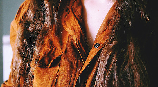 woman in brown collared shirt thumbnail