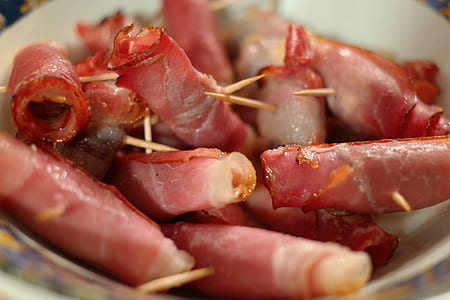 rolled hams with toothpicks in bowl thumbnail