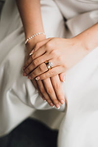 person showing silver-colored rings on her hand thumbnail