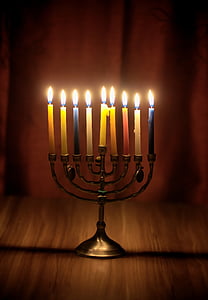 lighted taper candles on candlelabra thumbnail