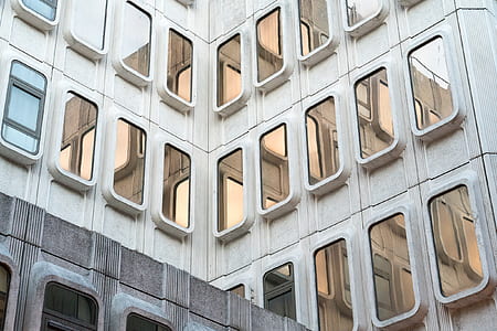 white concrete building at daytime thumbnail