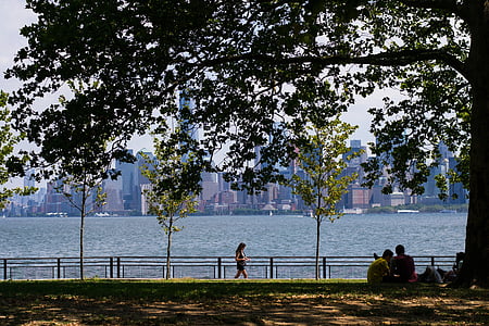 woman walking on sidewalk thumbnail